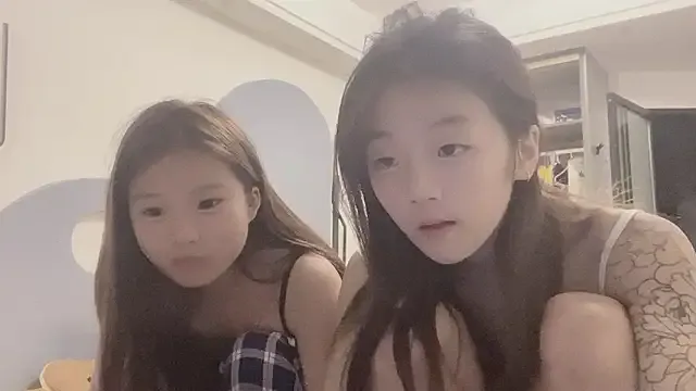 A-YY-TT — Two people perform close chest ma