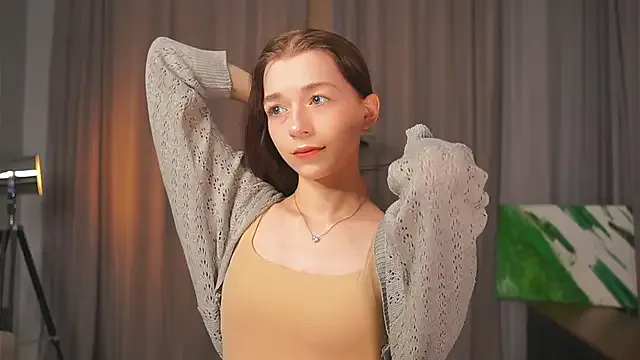 RoxieBolich — touching my shoulders and neckline