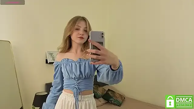Sue_Sanders — eye contact + teasing mouth